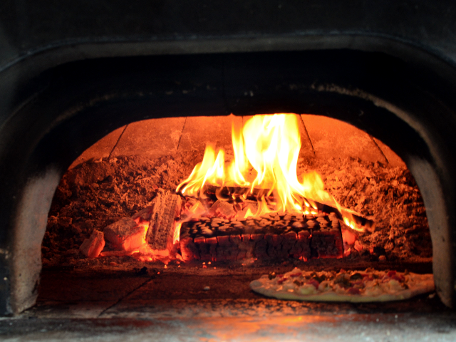 Pizza cooking in the oven